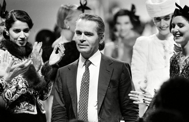 Karl Lagerfeld being applauded after his first Chanel show in 1983. Jacques Langevin/AP/REX/Shutterstock